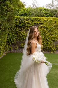 Radiant bride on her wedding day with natural makeup.